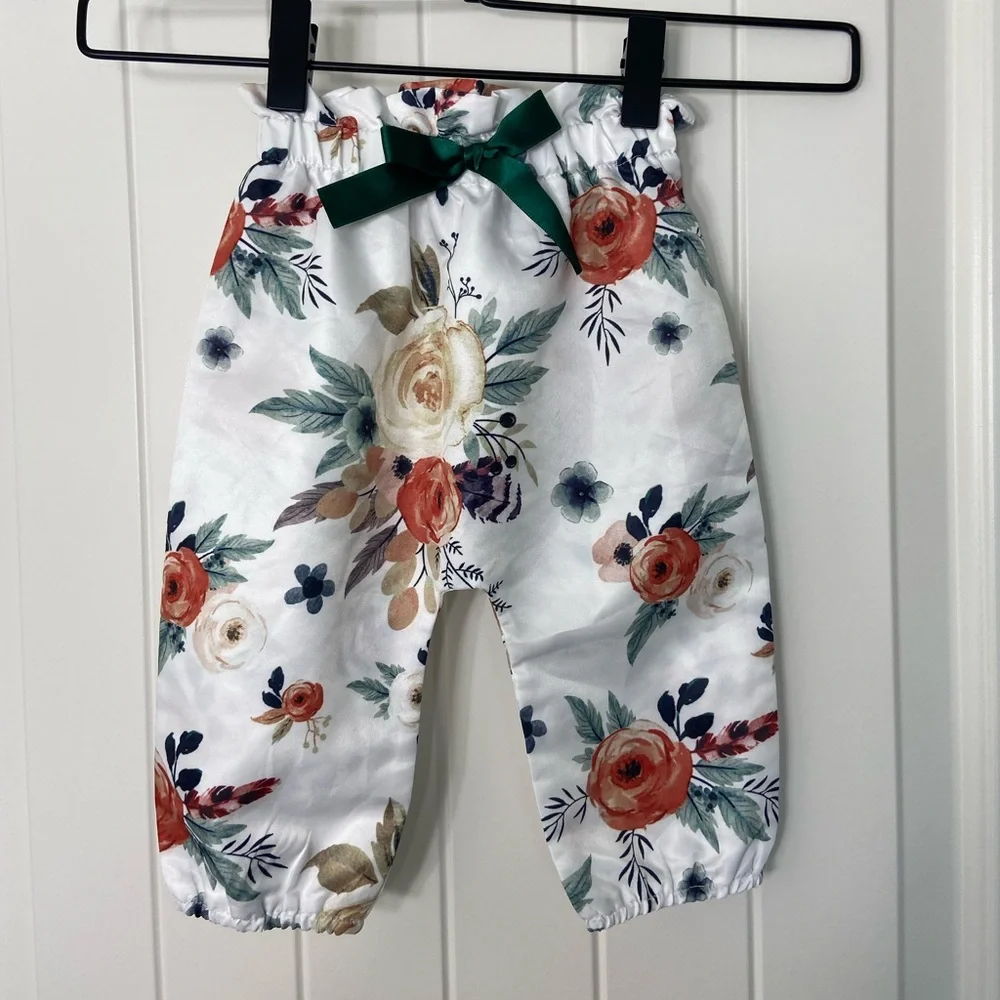NWOT baby girl’s white floral green ribbon elastic pull on silk pants bottoms
